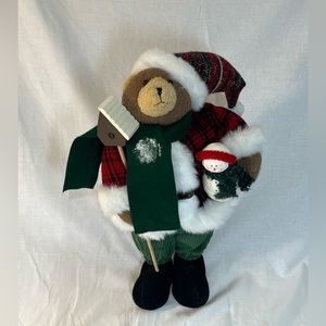 19” plush fabric bear with hat & scarf. Stands holding birdhouse and snowman.